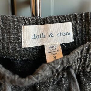 Cropped cloth & stone cotton pants with zipper pockets.